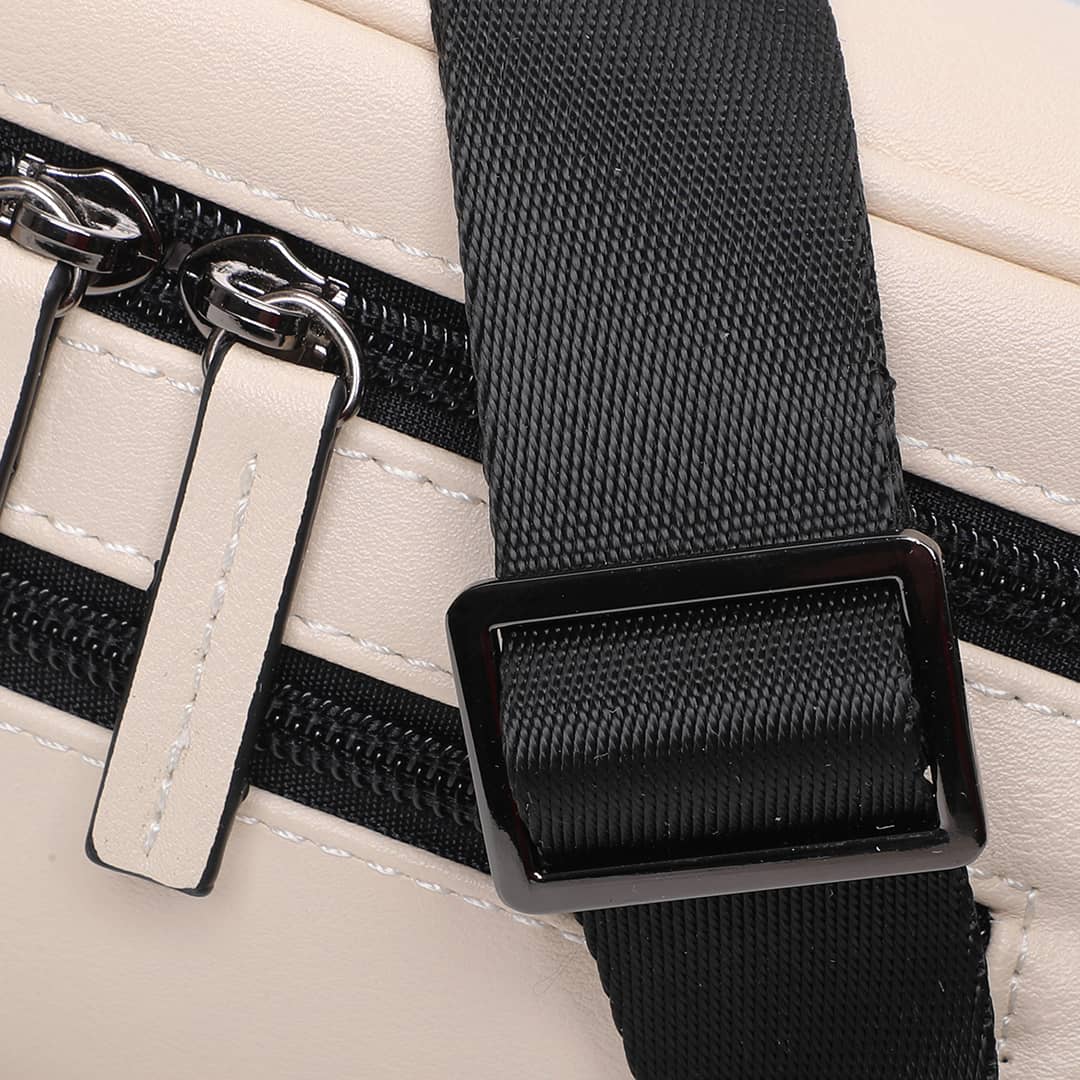 Close-up of the beige faux leather streetwear bum bag from cawa.me