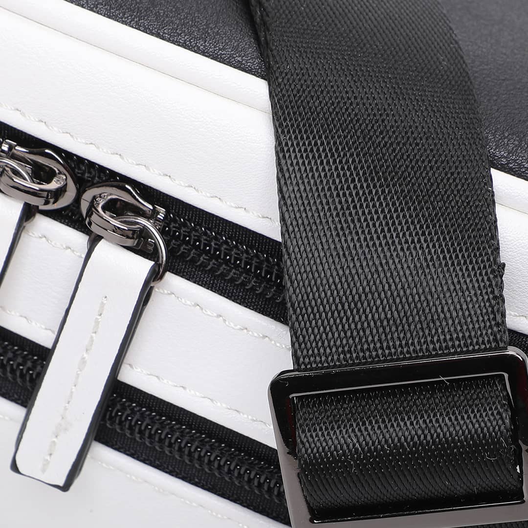 Close-up of the black and white faux leather streetwear bum bag from cawa.me