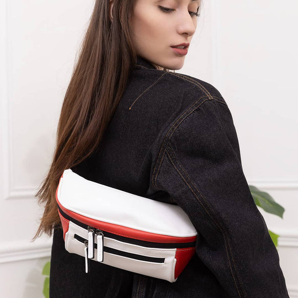 Woman wearing streetwear outfit with a white and red streetwear bum bag from cawa.me in a white room