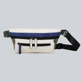 A white streetwear bum bag with a bit of navy and khaki, a black zipper and a black straps from cawa.me