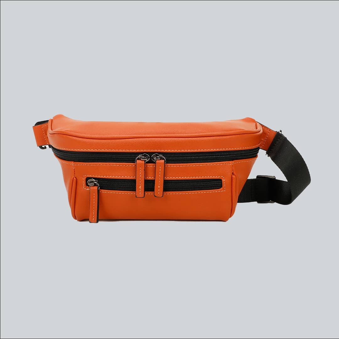 La Sacha Orange, an orange streetwear bum bag with a black zipper and straps from cawa.me