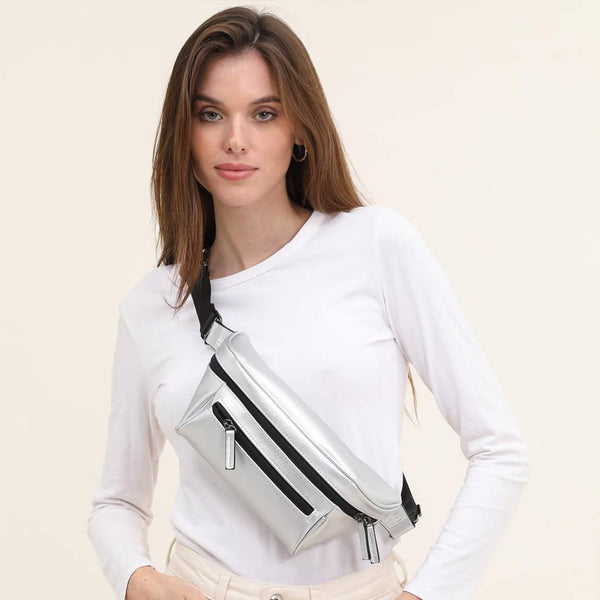 Woman on a white background with a silver streetwear bum bag from cawa.me