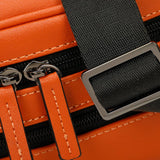 Close-up of the orange faux leather streetwear bum bag from cawa.me